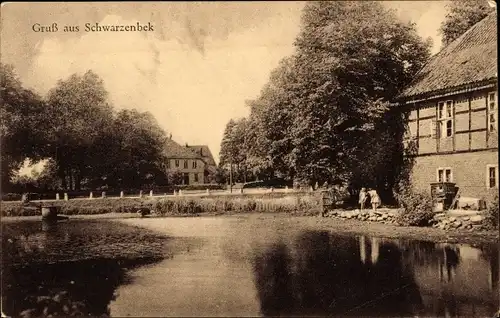 Ak Schwarzenbek in Lauenburg, Uferpartie am See, Fachwerkhaus