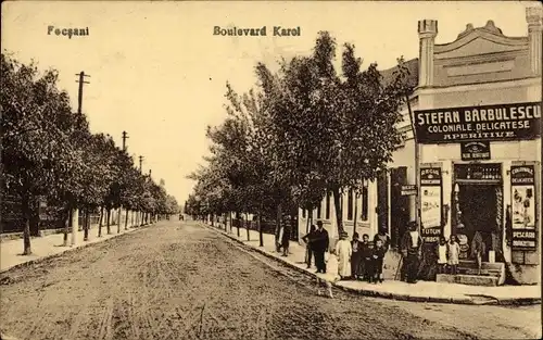 Ak Focșani Fokschan Rumänien, Boulevard Karol, Kolonialwaren Stefan Barbulescu