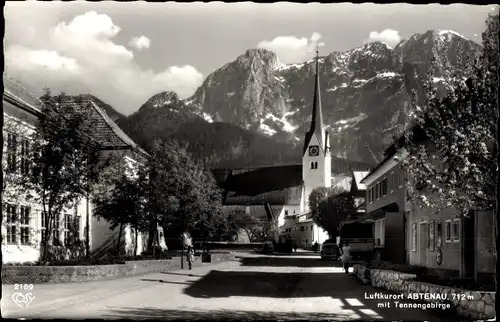 Ak Abtenau in Salzburg, Straßenpartie, Kirche, Tennengebirge