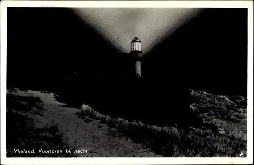 Ak Vlieland Friesland Niederlande, Leuchtturm bei Nacht