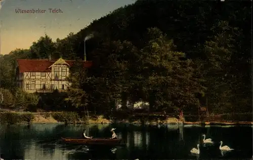 Ak Wiesenbek Bad Lauterberg im Harz, Wiesenbeker Teich, Ruderboot, Frau, Mann, Schwäne