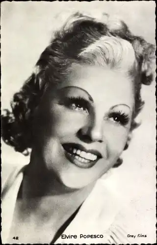 Ak Schauspielerin Elvire Popesco, Portrait, Makeup, Lockiges Haar