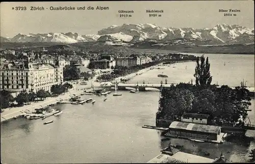 Ak Zürich, Quaibrücke und die Alpen