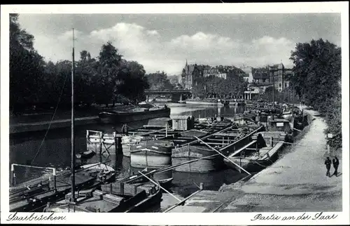 Ak Saarbrücken im Saarland, Partie an der Saar, Schiffe, Brücke