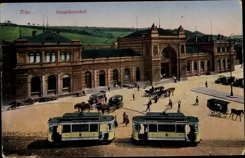 Ak Trier in Rheinland Pfalz, Hauptbahnhof, Straßenbahnen