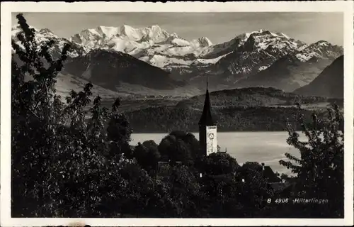 Ak Hilterfingen Thun Kanton Bern Schweiz, Gesamtansicht, Gebirge, Kirchturm