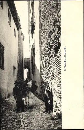 Ak Toledo Kastilien La Mancha Spanien, Blick in die Gasse, Mann mit Esel, Junge