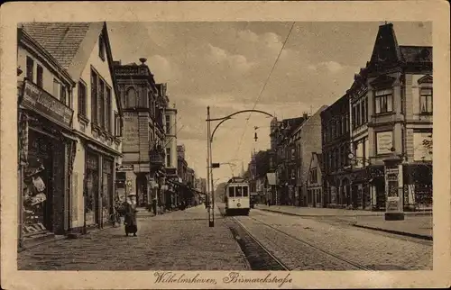 Ak Wilhelmshaven an der Nordsee, Bismarckstraße, Straßenbahn, Geschäfte