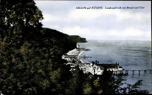Ak Ostseebad Sellin auf Rügen, Landungsbrücke mit Strand und Ufer