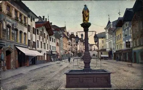 Ak Bad Tölz an der Isar Oberbayern, Untere Marktstraße mit Brunnen