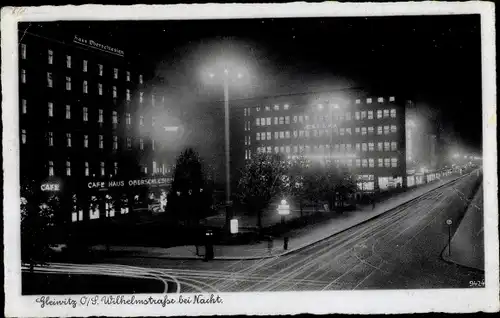 Ak Gliwice Gleiwitz Oberschlesien, Wilhelmstraße bei Nacht, Café Haus Oberschlesien