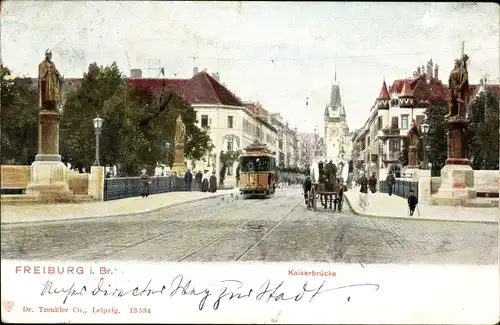 Ak Freiburg im Breisgau, Kaiserbrücke, Tram, Kutsche, Denkmal
