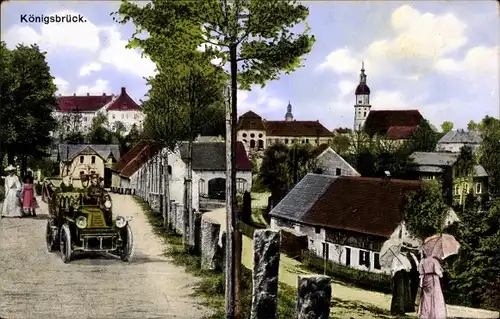 Ak Königsbrück in der Oberlausitz, Straßenpartie mit Blick auf den Ort, Kirche