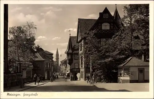 Ak Meiningen in Thüringen, Georgstraße, Geschäfte, Kirche, Passanten