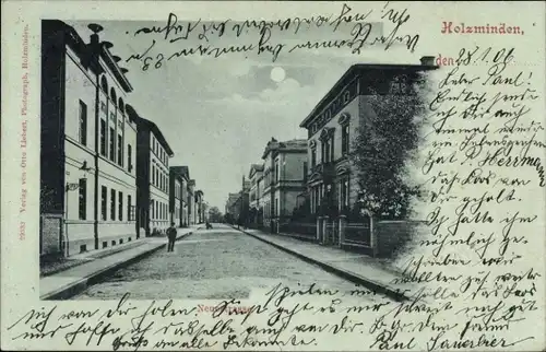 Mondschein Ak Holzminden im Weserbergland, Neuestraße, Straßenpartie