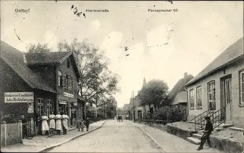 Ak Gettorf Schleswig Holstein, Herrenstraße, Straßenpartie, Bäckerei Johs. Reifenhausen