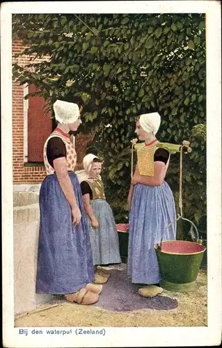 Ak Zeeland, Bij den waterput, Mädchen in Volkstrachten