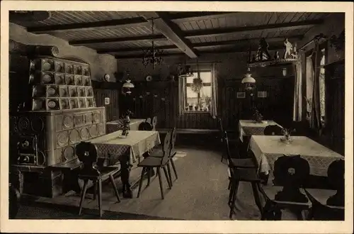 Ak Tellerhäuser Breitenbrunn im Erzgebirge, Schneiders Gasthof, Kachelofen