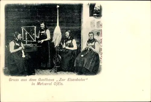 Ak Gasthaus Zur Eisenbahn in Metseral, Elsässer Tracht, Spinnrad