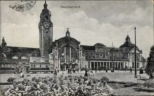 Ak Wiesbaden in Hessen, Hauptbahnhof, Straßenbahn, Turmuhr