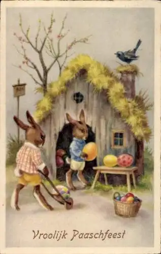 Ak Glückwunsch Ostern, Vermenschlichte Hasen, bunte Ostereier