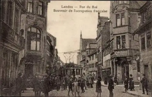 Ak Landau in der Pfalz, Königstraße zur Zeit der französischen Besetzung, Straßenbahn