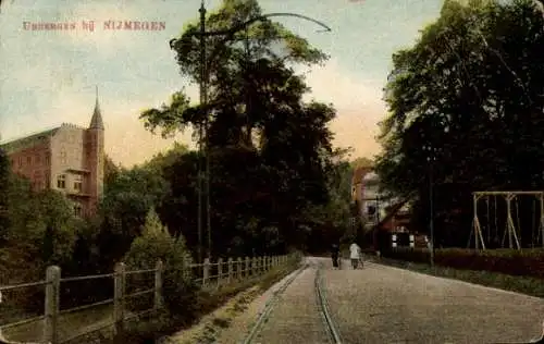 Ak Ubbergen Gelderland Niederlande, Straßenpartie, Bahnschienen