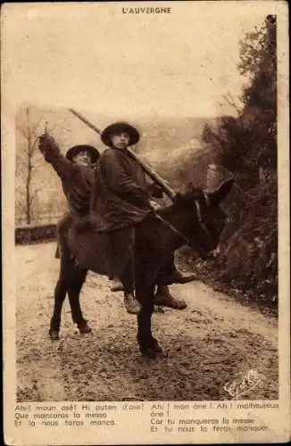 Ak Auvergne, Menschen reiten auf Esel, Französische Tracht