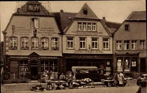 Ak Sankt Wendel Saarland, Häuser mit Bekenntnissprüchen am Domplatz, Marktstände