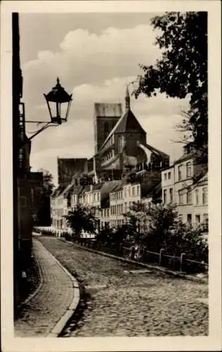 Ak Wismar in Mecklenburg, Mühlengrube mit Sankt Nikolaikirche