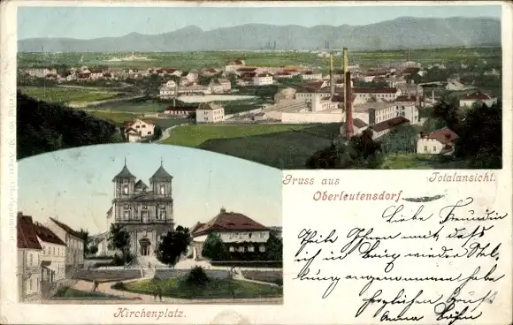 Ak Litvínov Oberleutensdorf Reg. Aussig, Totalansicht vom Ort, Kirchenplatz