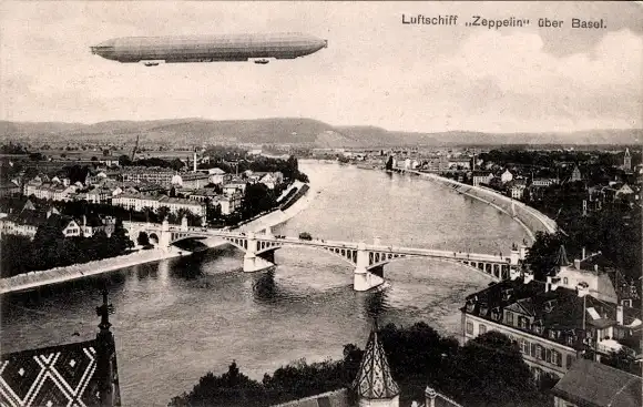 Ak Basel Stadt Schweiz, Gesamtansicht, Brücke, Luftschiff Zeppelin