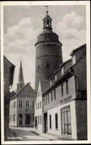 Ak Stadt Prettin Annaburg im Kreis Wittenberg, alter Turm, Geschäft