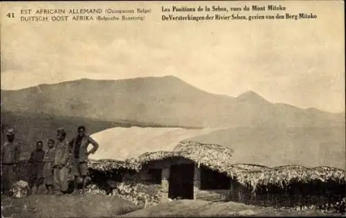 Ganzsachen Ak DR Kongo Zaire, Sebea, Berg Mitoko, Anwohner vor Hütten, Belgische Besatzung
