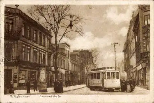 Ak Wilhelmshaven an der Nordsee, Straßenbahn in der Bismarckstraße, Litfaßsäule