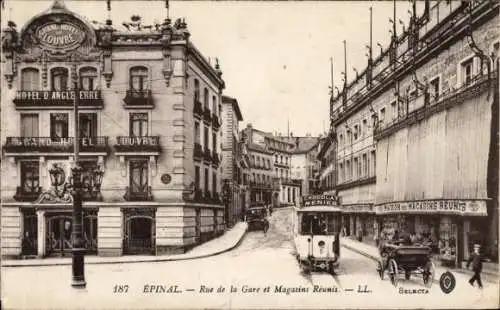 Ak Épinal Lothringen Vosges, Rue de la Gare et Magasins Reuins