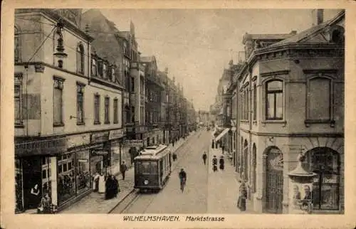 Ak Wilhelmshaven an der Nordsee, Marktstraße, Geschäfte, Straßenbahn, Litfaßsäule