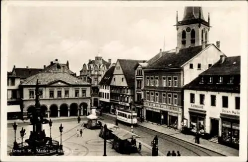Ak Unna in Westfalen, Marktplatz, Kriegerdenkmal, Rathaus, Straßenbahn