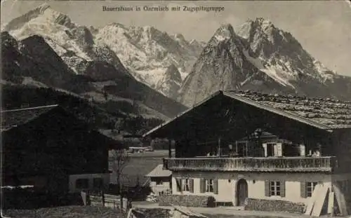 Ak Garmisch Partenkirchen in Oberbayern, Bauernhaus mit  Zugspitzgruppe