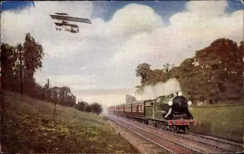 Ak Britische Eisenbahn, Zivilflugzeug, Bahnschienen