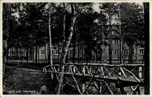 Ak Świebodzin Schwiebus Ostbrandenburg, Tiborlager, Gebäude, Holzbrücke