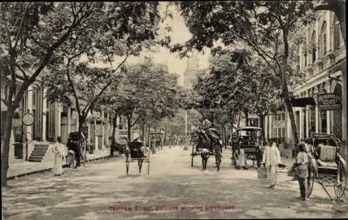 Ak Colombo Ceylon Sri Lanka, Straßenpartie mit Leuchtturm im Hintergrund, Rikschas