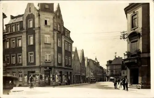 Ak Pulsnitz Sachsen, Straßenpartie, Radfahrer, Buchbinderei, Buchhandlung