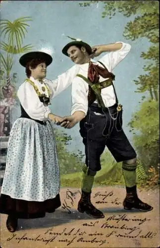 Ak Tanzendes Paar in bayrischen Trachten, Lederhose, Dirndl