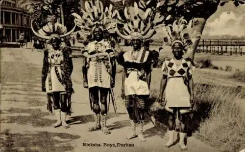 Ak Durban Südafrika, Rikschafahrer in Tracht