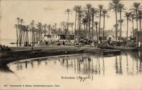Ak Bedrechen Ägypten, Ort mit Palmen vom Ufer aus gesehen