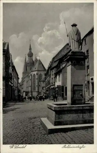 Ak St. Wendel im Saarland, Balduinstraße, Kirche, Brunnen, Statue