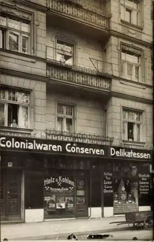 Foto Ak Kolonialwarenhandlung, Holz und Kohlen, Hermann Riedel
