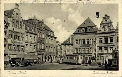 Ak Düren im Rheinland, am Rathaus, Giebelhaus, Straßenbahn