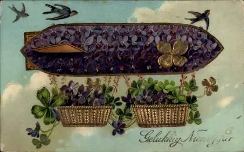 Präge Litho Glückwunsch Neujahr, Luftschiff, Kleeblätter, Veilchen